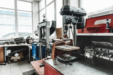 Different tools on workbench in car service
