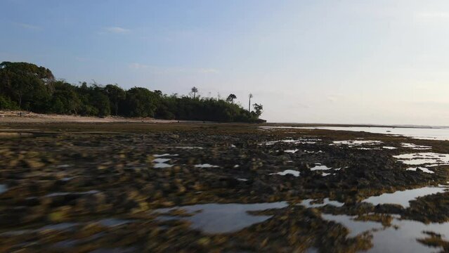 Flying low over the G-Land coastline, Plengkung Beach, Java, Indonesia