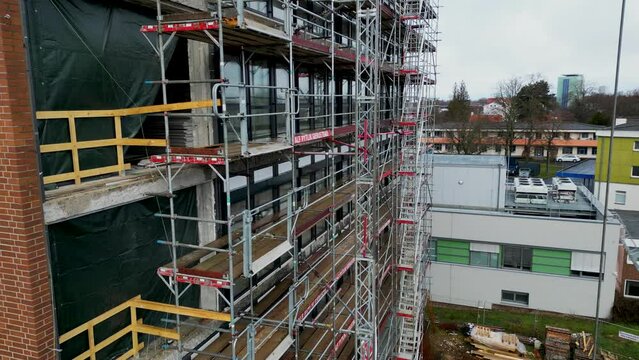Close up shot of construction site of an office building in Brunswick, Germany at daytime.