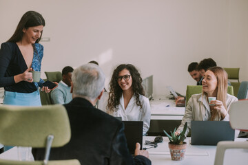 Group of business women working with their boss