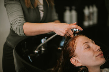 Fototapeta premium Close up of girl relaxing on the sink