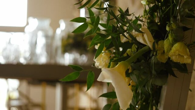 Wedding flower arrangement at ceremony venue 