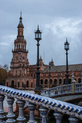 Fototapeta na wymiar SEVILLA, SPAIN - DECEMBER 2023: Plaza de España on a rainy day