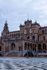 Fototapeta premium SEVILLA, SPAIN - DECEMBER 2023: Plaza de España on a rainy day