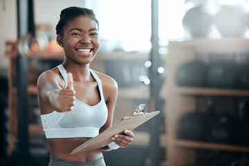 Thumbs up, personal trainer portrait or happy black woman at gym for workout, exercise or fitness...