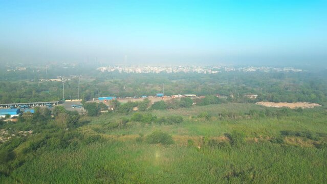 Delhi: Aerial view of capital city of India in spring - landscape panorama of South Asia from above