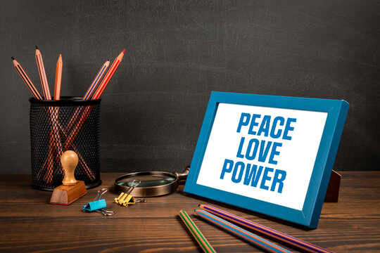 Peace Love Power. Text in the picture frame