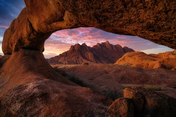 Wall murals Rood violet Dramatic sunset over Spitzkoppe, Namibia, Africa.