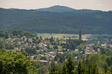 Fototapeta na wymiar Scenic overview of the town Zwiesel in Bavaria, Germany on sunny day with clouds