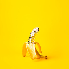 Disco banana design. Abstract creative concept on yellow.