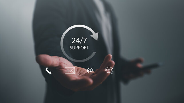 Businessman showing virtual 24-7 support services for worldwide nonstop and full-time available contact of service concept. Assistance customer services, Care and consulting client 24hr, Call Center.