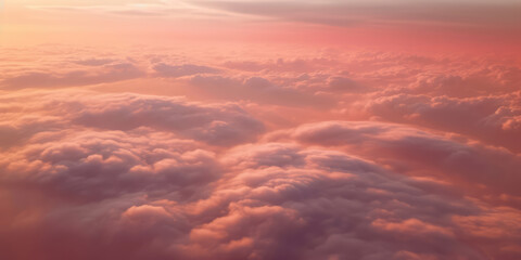 Obraz premium Sunset sun reflects on the clouds from an airplane.