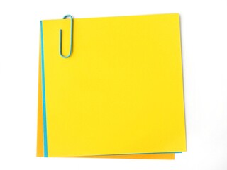 Isolated  yellow memo note on a white background and copy space