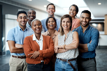 Diversity, portrait of happy colleagues and smile together in a office at their workplace. Team or...