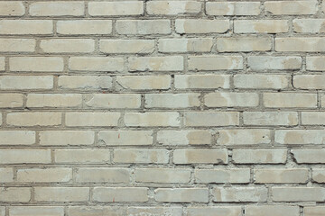 Grey brick wall texture background. Tiled close up
