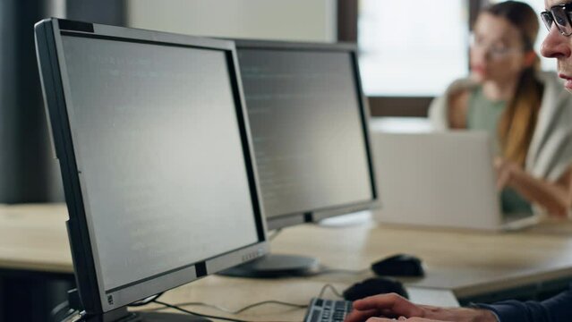 Engineer hands typing computer closeup. Professional software developer coding