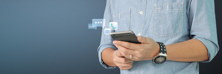 Man holding smartphone device  touching screen