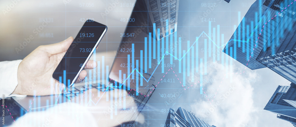 Aufkleber close up of male hands using laptop and cellphone on abstract wide city background with forex chart 