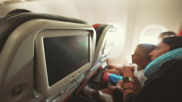 Airplane seat screen, in-flight travel entertainment system.