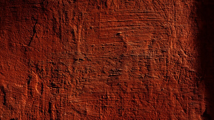 Old plaster wall with traces of scratches and sanding.