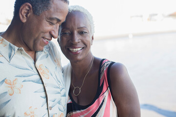 Obraz premium Portrait of senior couple hugging