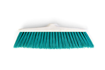 Green stiff outdoor broom on a white background. Cleaning equipment for housework. Top view.