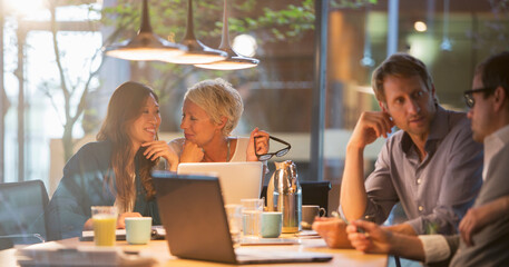 Businesswomen talking in office meeting