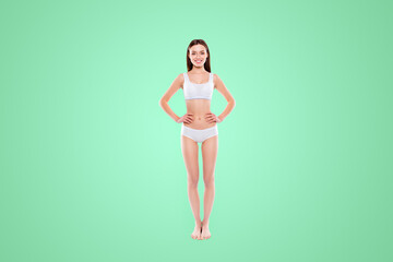 Fototapeta na wymiar Fullbody portrait of thin slender woman in cotton underwear bikini bra demonstrate ideal body isolated on white background. Enhancement concept