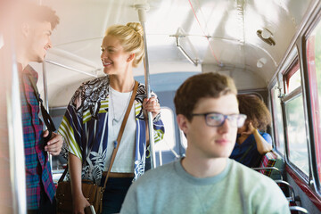 Friends talking on bus