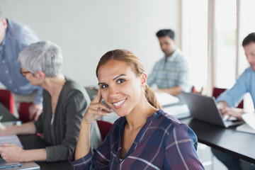 Portrait confident adult education student in classroom