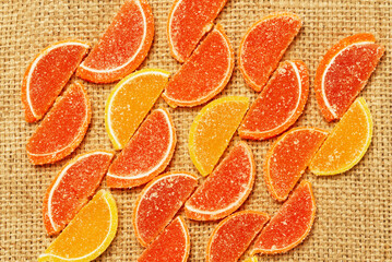 A pattern of marmalade slices on a plain fabric