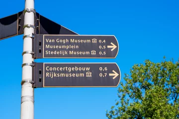 Fototapeten Directional Signs to Van Gogh, Rijks and Stedelijk Museum in Amsterdam, The Netherlands. The Concertgebouw is a Concert Hall. Museumplein means Museum Square. © allard1