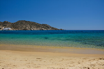 Obraz premium Breathtaking panoramic view of the famous Mylopotas beach in Ios Greece