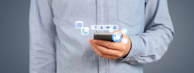 Man holding smartphone device  touching screen