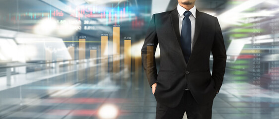 Handsome  businessman in swanky stylish suit plan graph growth and increase of chart positive