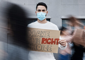 Protest signage, man face mask and portrait with fight, human rights and rally sign in city. Urban, group and protesting people with a male person holding a pro vaccine movement poster on a street