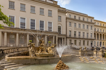 Neptune fountain located in Cheltenham town centre, England © Jim