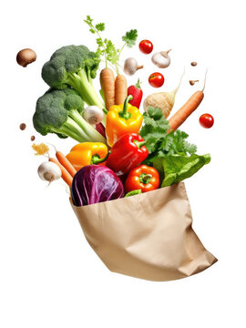 Assortment of vegetables flying into paper bag isolated on white background