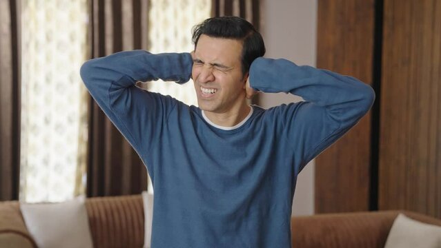 Stressed and frustrated Indian man going mad