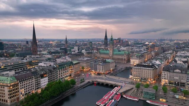 Aerial view over the Hamburg at sunset. drone flying over Alster lake. city skyline. Germany