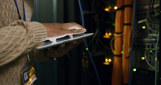 Hands of man in data center with tablet, network administration and engineer in digital storage for cyber security. Tech employee, system maintenance and technician online in server room for update.