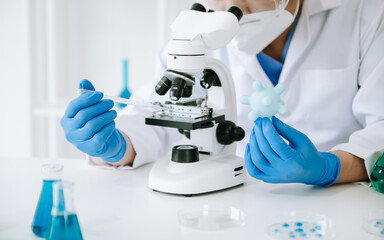 Male biotechnologist testing new chemical substances in a laboratory.