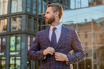 caucasian entrepreneur wearing jacket in the street. photo of entrepreneur with tie