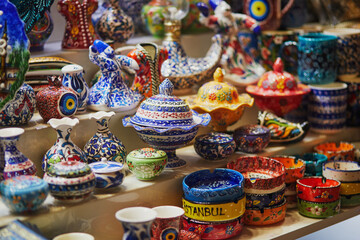 Fototapeta na wymiar Selection of colorful ceramics on Egyptian Bazaar or Spice Bazaar, one of the largest bazaars in Istanbul, Turkey