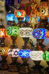 Selection of colorful Turkish lamps on Egyptian Bazaar or Spice Bazaar, one of the largest bazaars in Istanbul, Turkey