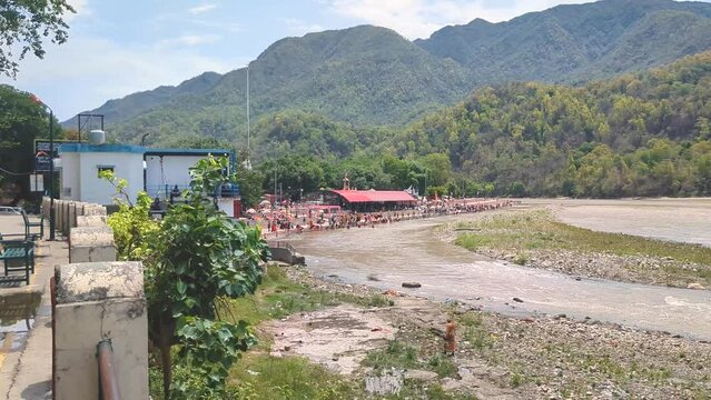 Triveni ghat of Holy Ganga or Ganges river in hindu pilgrimage city of Rishikesh Uttrakhand India