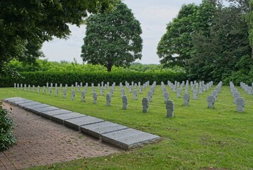 Bohonye, Hungary - Jun 2, 2023: German Second World War cemetery in Bohonye. There are 2080 graves here. Spring cloudy day. Selective focus.