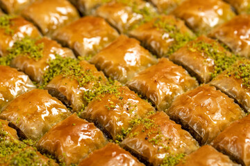 Turkish baklava. Butter pistachio baklava. Turkish cuisine delicacies Close up