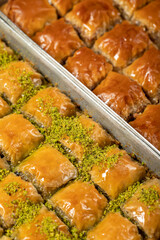 Turkish baklava. Pistachio and walnut baklava. Turkish cuisine delicacies. Delicious baklava with butter