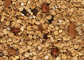 Granola with nuts and raisins as a background texture